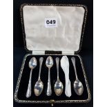 Six antique silver teaspoons in case