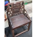 Antique curved oriental carved chair
