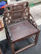 Antique curved oriental carved chair