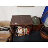 2 sticks, rug, table and waste paper bin