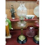 Antique clear glass oil lamp