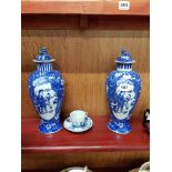 PAIR OF ANTIQUE ORIENTAL TEMPLE JARS AND LIDS AND CUP AND SAUCER