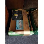 BOX OF CAR OILS AND MANUALS