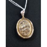 GOLD BACK AND FRONT LOCKET