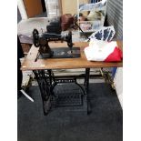 SINGER SEWING MACHINE ON TABLE