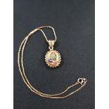 14CT GOLD MOUNTED OPAL DROP ON 9CT GOLD CHAIN