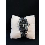 1980'S ROLEX OYSTER PERPETUL DATEJUST WATCH WITH BLACK DIAL 16030. COMES WITH ORIGINAL MANUAL AND IN