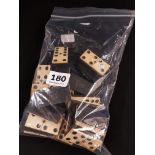 BAG OF EBONY & IVORY DOMINOES