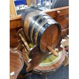 OLD WOODEN WHISKY BARREL ON STAND