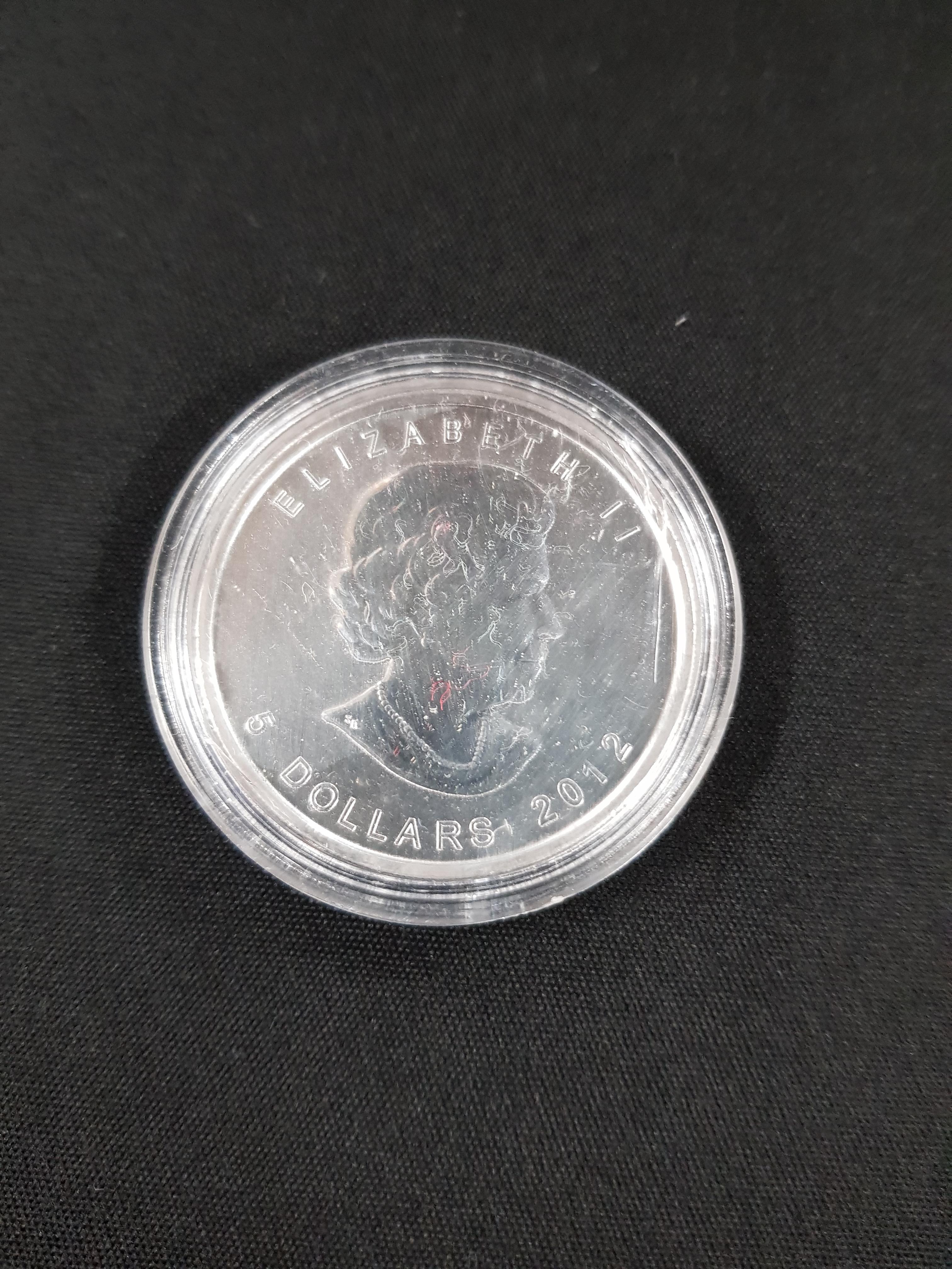 CANADIAN 5 DOLLAR SILVER COIN