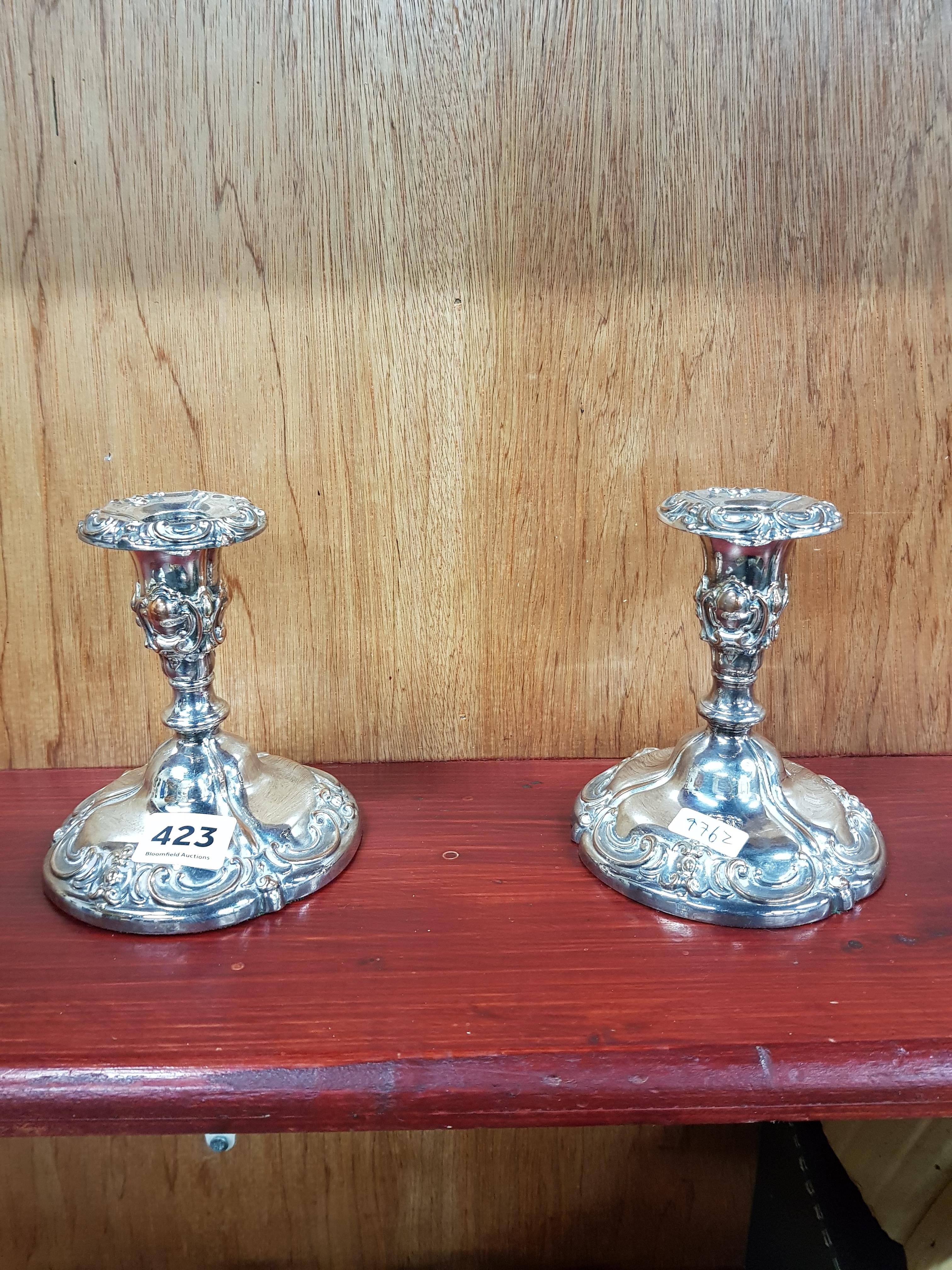 PAIR OF PLATED CANDLESTICKS