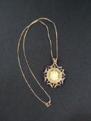 22 CARAT GOLD COIN IN 9CT GOLD AND DIAMOND MOUNT ON 9CT GOLD CHAIN 9 GRAMS