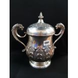 LARGE TWIN HANDLE LIDDED SILVER CUP WITH ANTHEMION DECORATION STANDING APPROX 12' HIGH BY