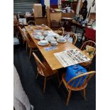 ERCOL STYLE EXTENDING DINING TABLE AND 8 CHAIRS