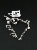 CHARM BRACELET AND SILVER SINGLE STONE RING