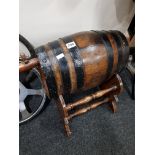 OLD WOODEN BARREL AND STAND