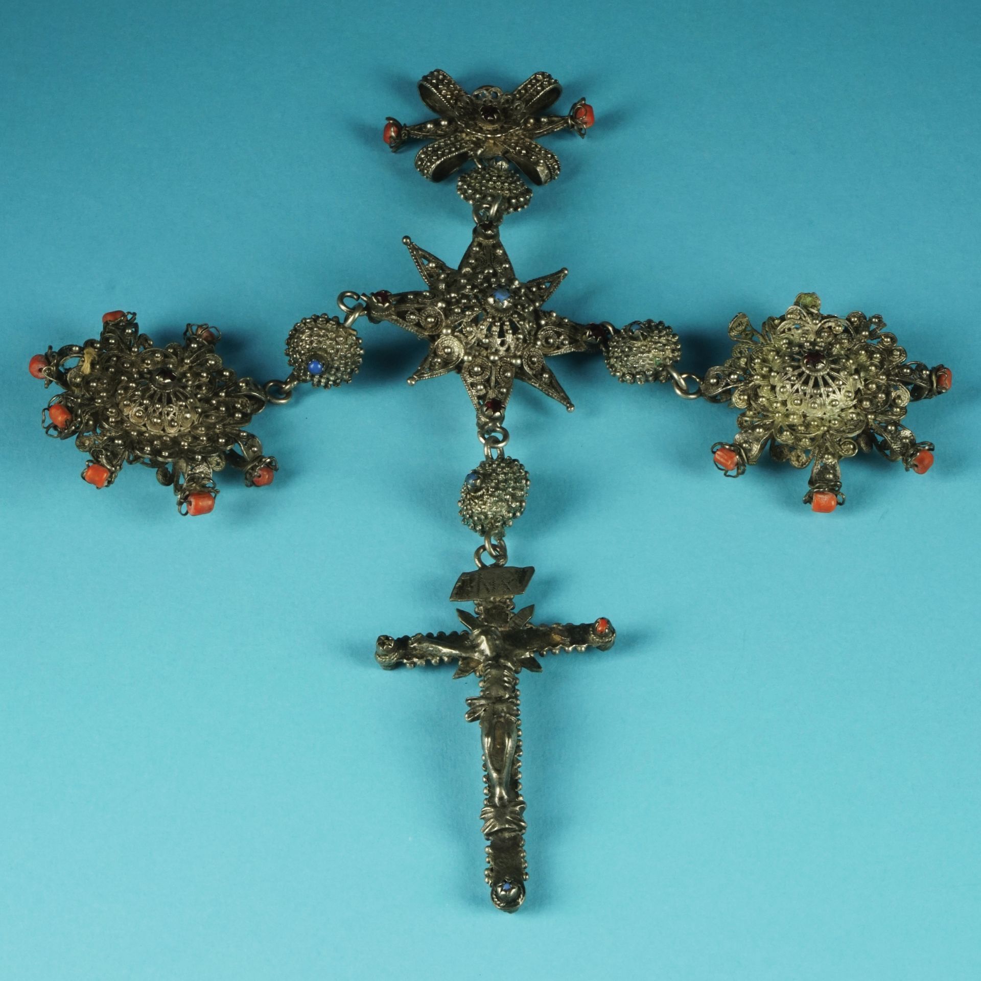 A Southern Italy silver filigree and coral pendant, 19th century 32by22cm., 138gr. gross weight