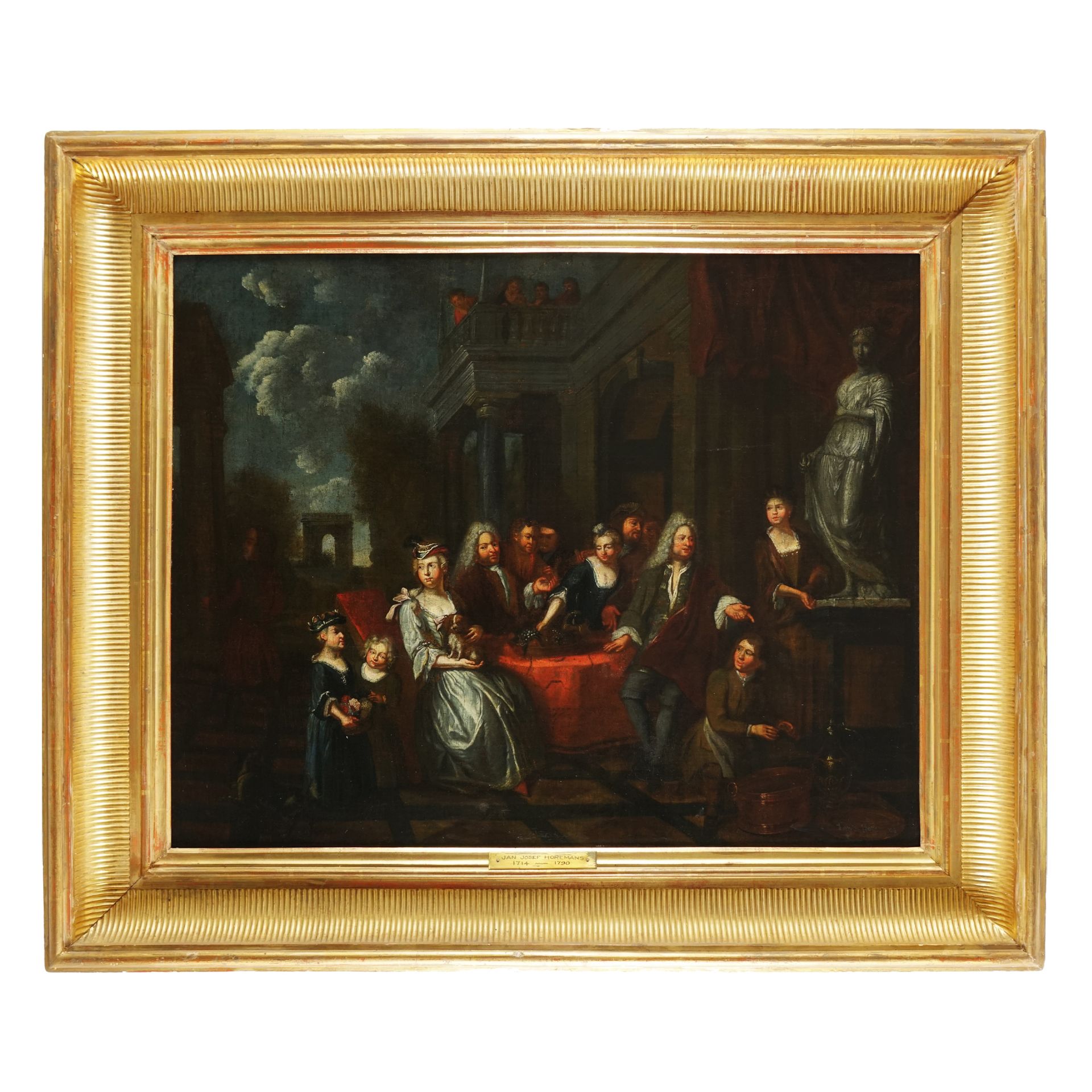 Jan Josef Horemans Family portrait around a tableoil on canvas, 64by81cm.Signed on lower right: