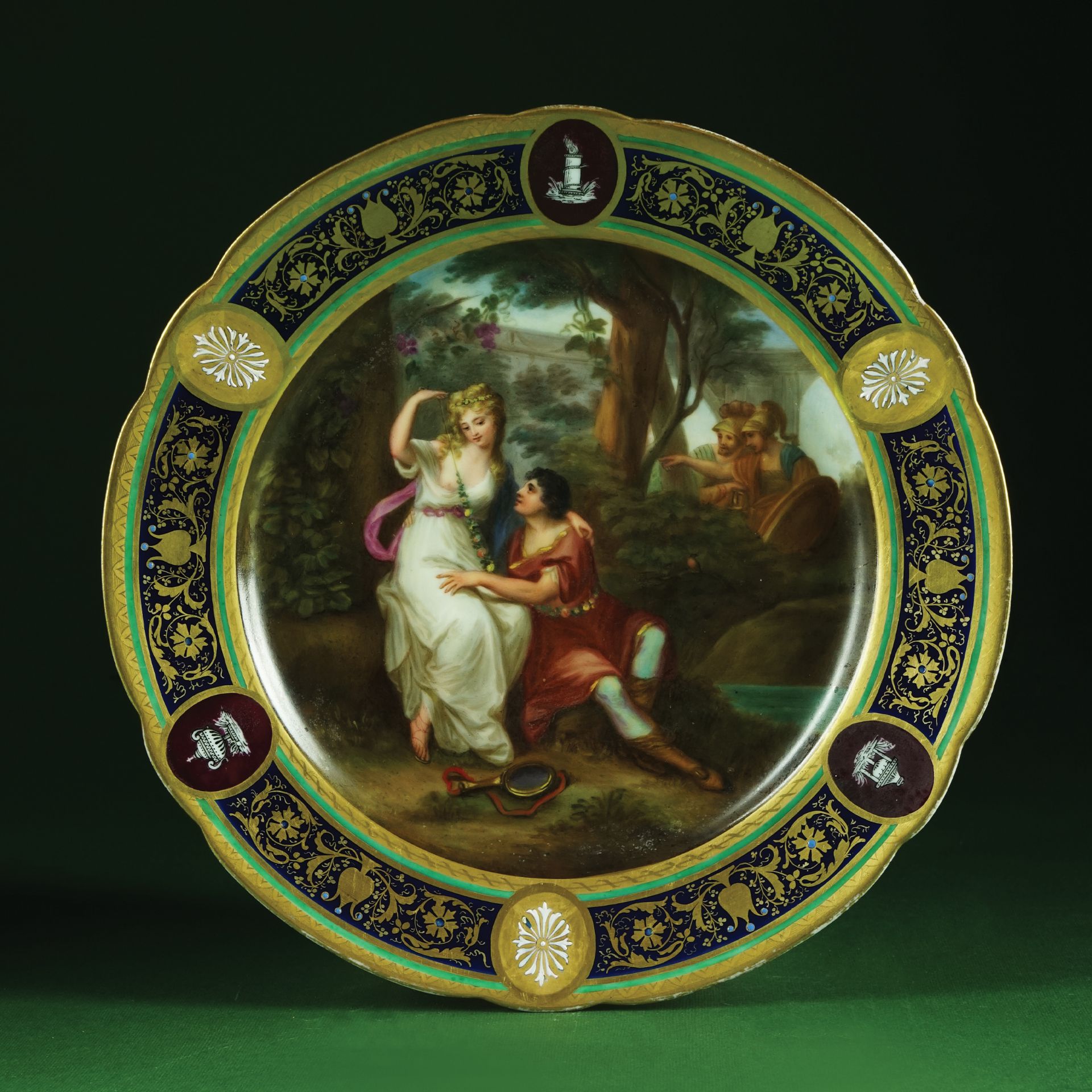 A Viennese polychrome and gilt porcelain plate, 19th century 25cm. diam.