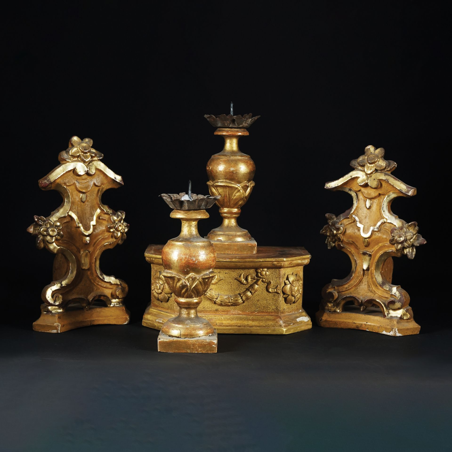 A paior of lacquered and gilt friezes, 18th-19th century TOGETHER WITH a pair of gilt wood