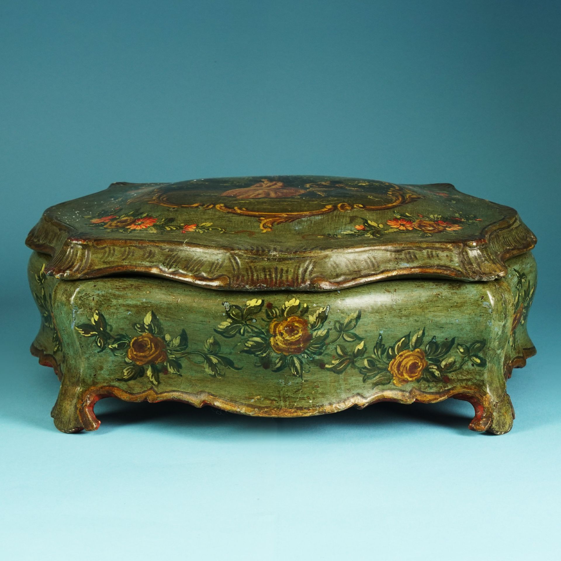 A Venetian green lacquered and painted wood casket, 18th century 16x41x33cm.