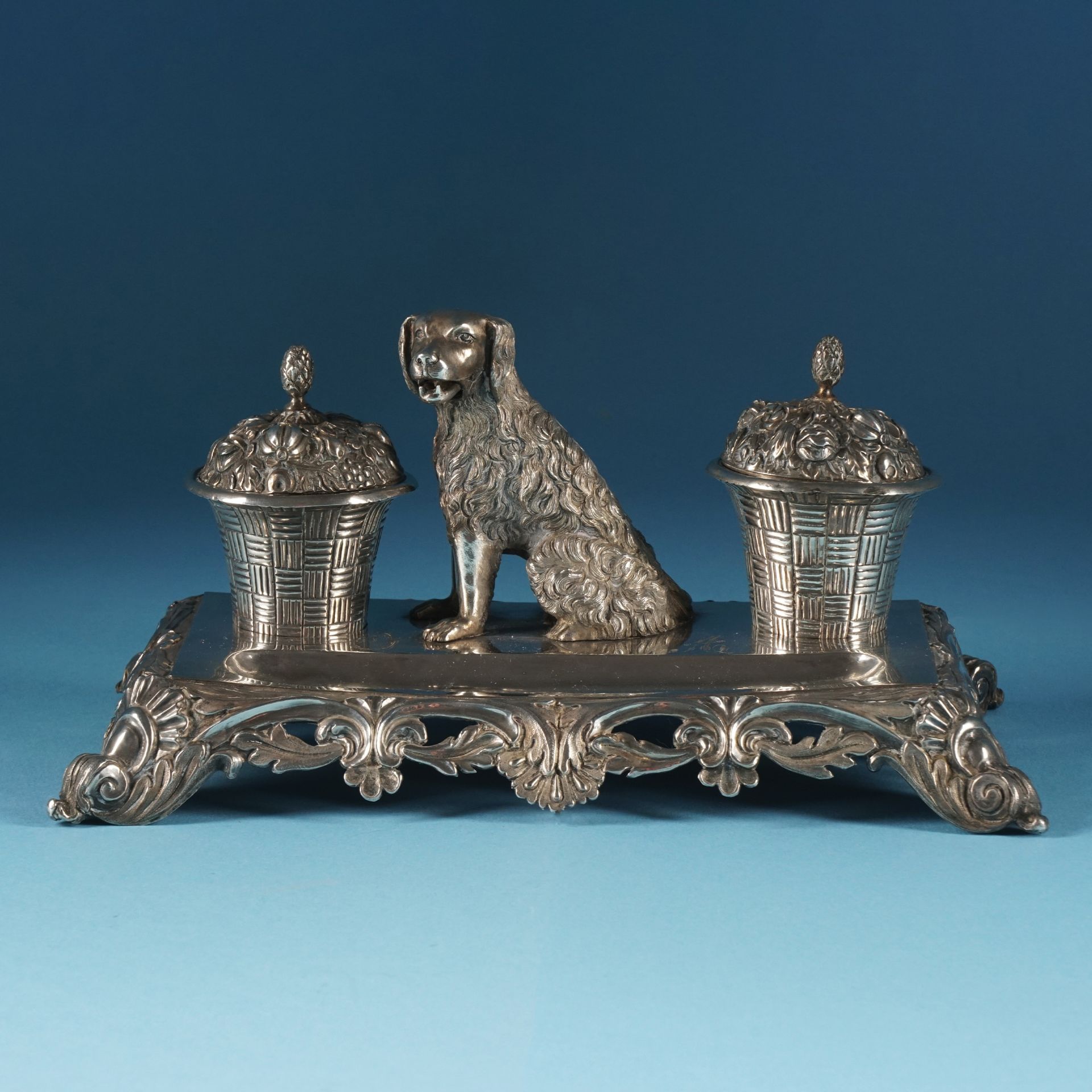 A Roman embossed and chiselled silver inkstand, 19th century 11x22,5x12,5cm., 420gr. weight