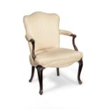 A George III mahogany and upholstered armchair, in the French Hepplewhite taste, circa 1770