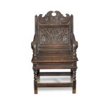 A good Charles II joined oak panel-back open armchair, Lancashire, circa 1670