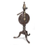 A George III mahogany spinning wheel, circa 1790