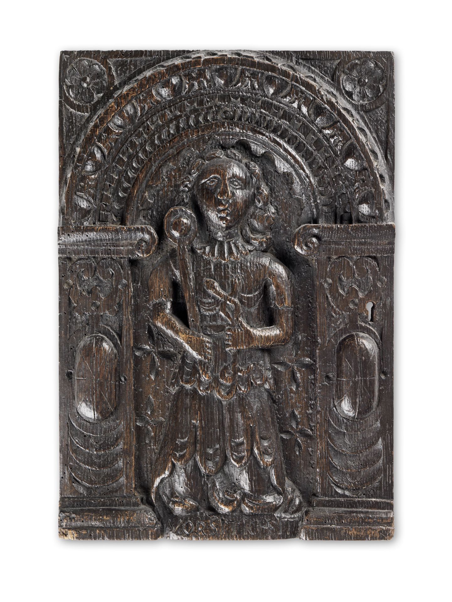 An early 17th century carved oak panel, Dutch/German, Prudence