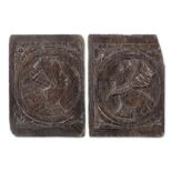 A pair of mid-16th century carved oak Romayne-type portrait panels, English, circa 1540-1560 (2)