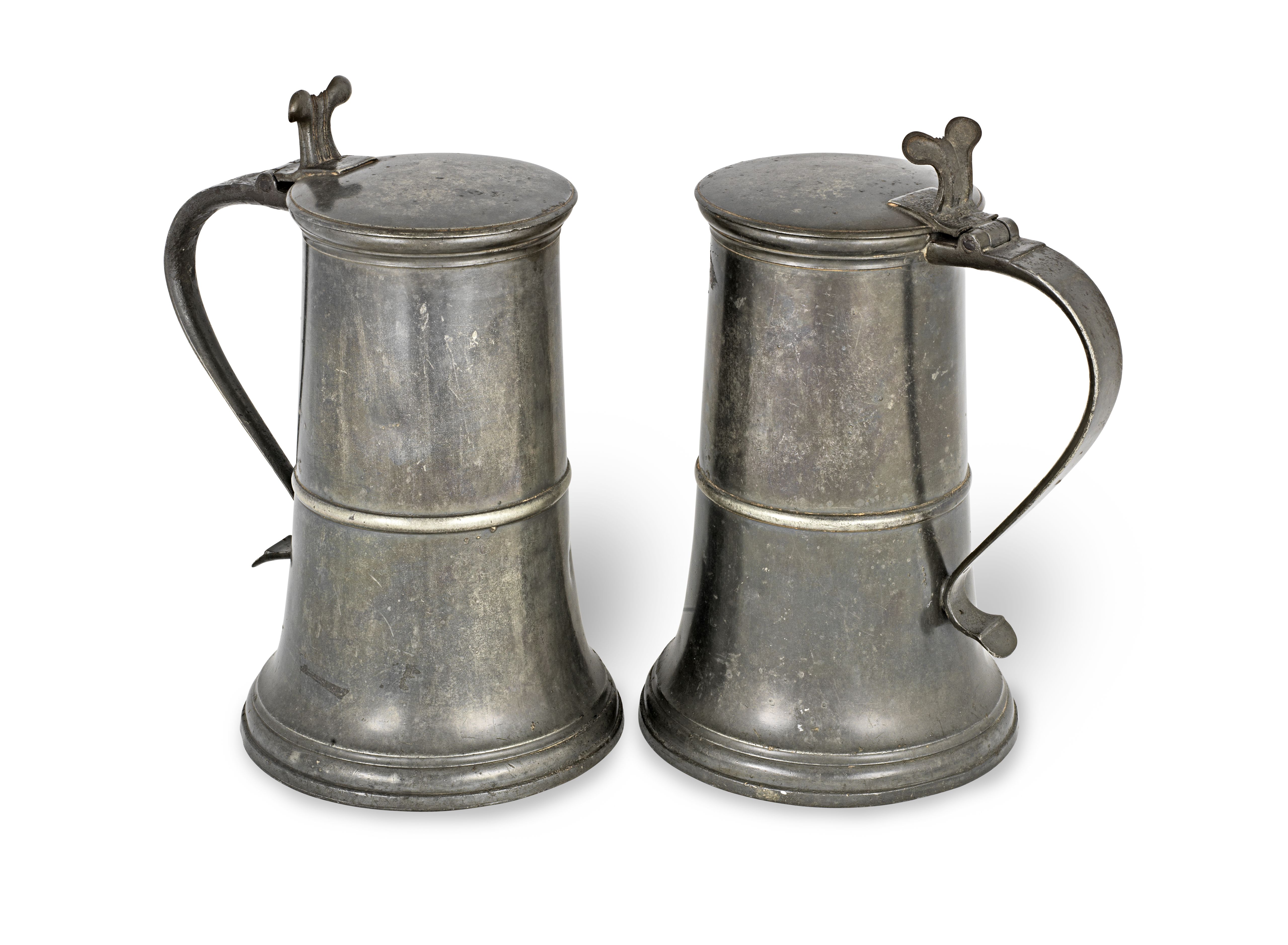 A good pair of George II pewter London-made tall flat-lid flagons, English ale gallon capacity, S...