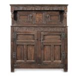 A Charles I joined oak and marquetry-inlaid press cupboard, Yorkshire, circa 1630