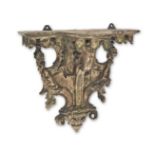 A paint-decorated softwood wall bracket, in the French R&#233;gence manner