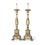 A pair of 18th century and later parcel-gilt and polychrome-painted floor-standing torcheres, con...