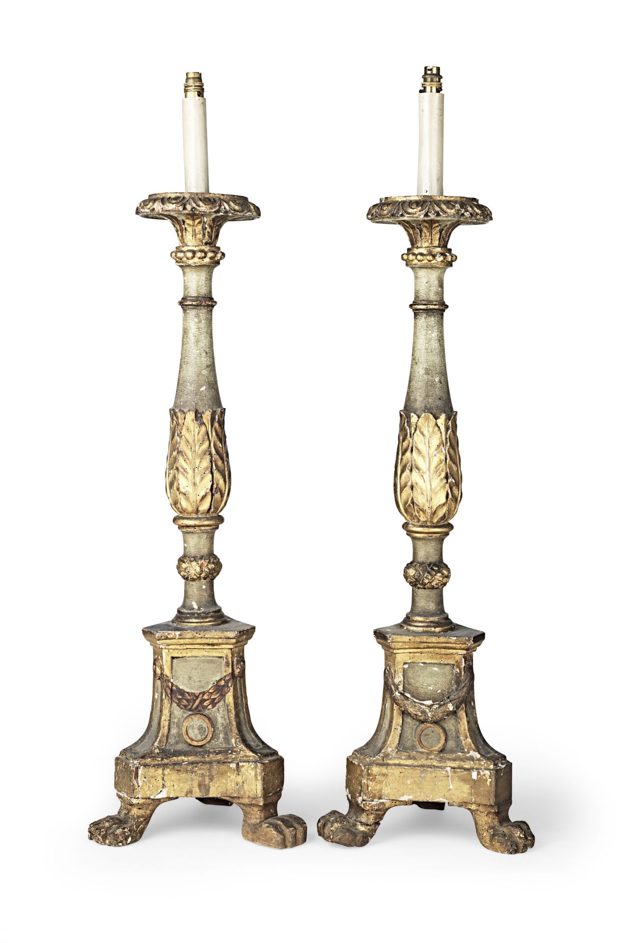 A pair of 18th century and later parcel-gilt and polychrome-painted floor-standing torcheres, con...