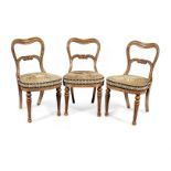 A set of three Victorian maple dining chairs, circa 1840 By Taprell, Holland & Sons, London (fl.1...