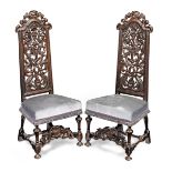 A pair of late 17th century walnut high-back chairs, Anglo-Dutch In the manner of Daniel Marot (1...