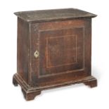 A George I oak table-top spice cupboard, circa 1715