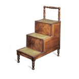 A set of early 19th century mahogany and tooled leather bed steps, English