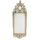 An ornate giltwood mirror, french