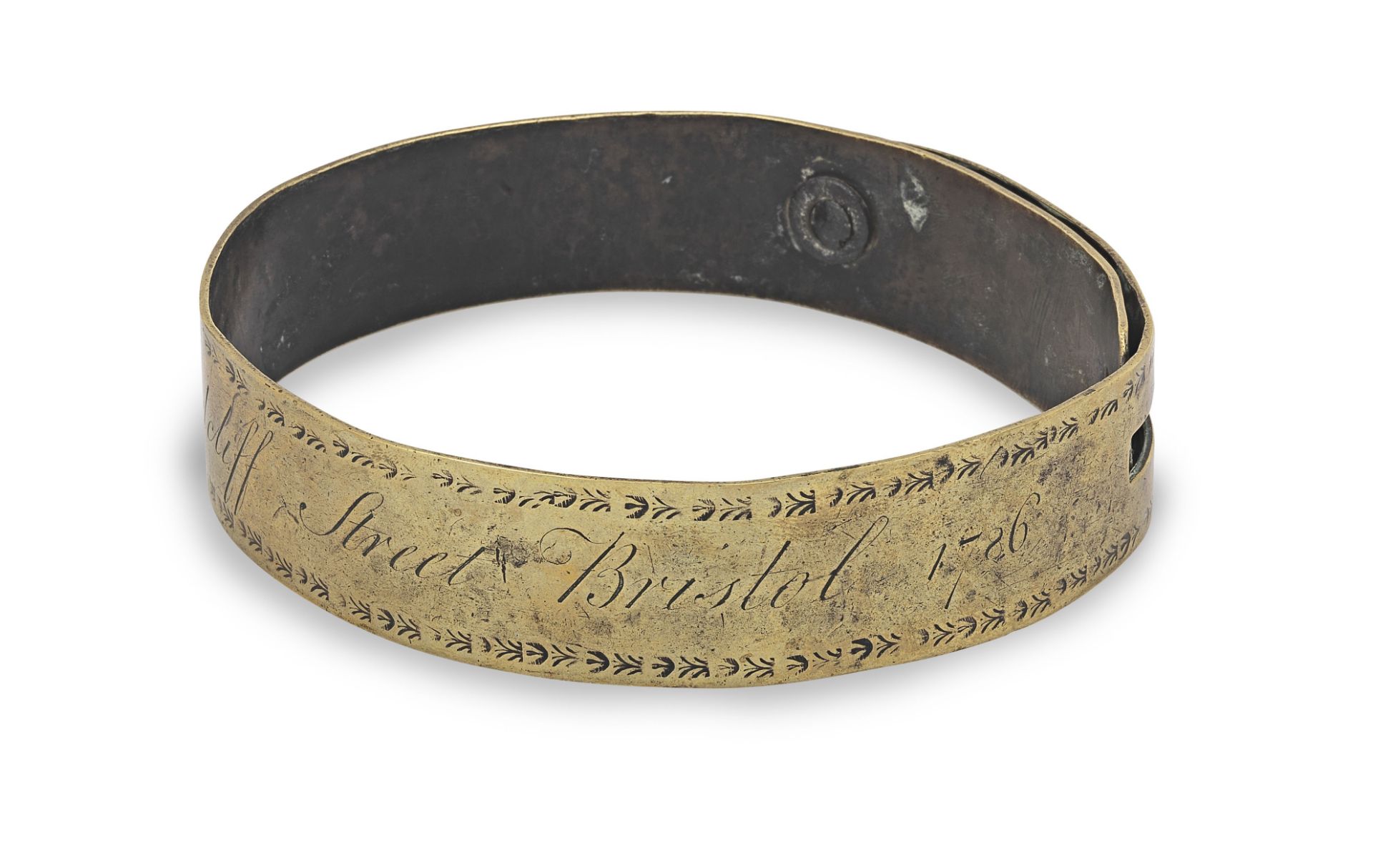 A George III brass dog collar, dated 1786