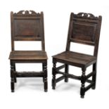 A pair of Charles II oak backstools, North Country, circa 1680 (2)