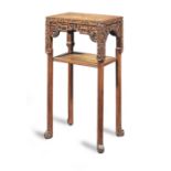 An early 20th century hardwood two-tier stand, Chinese