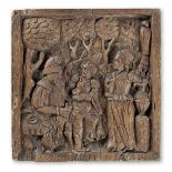 A 17th century carved oak panel, Flemish
