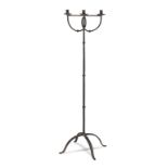 A wrought iron candle stand