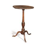 A George III elm tripod table, circa 1770