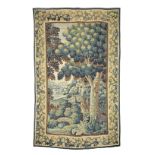 An early 18th century verdure tapestry, Flemish