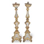 A pair of late 18th century giltwood and etched glass altar candlesticks, Italian (2)