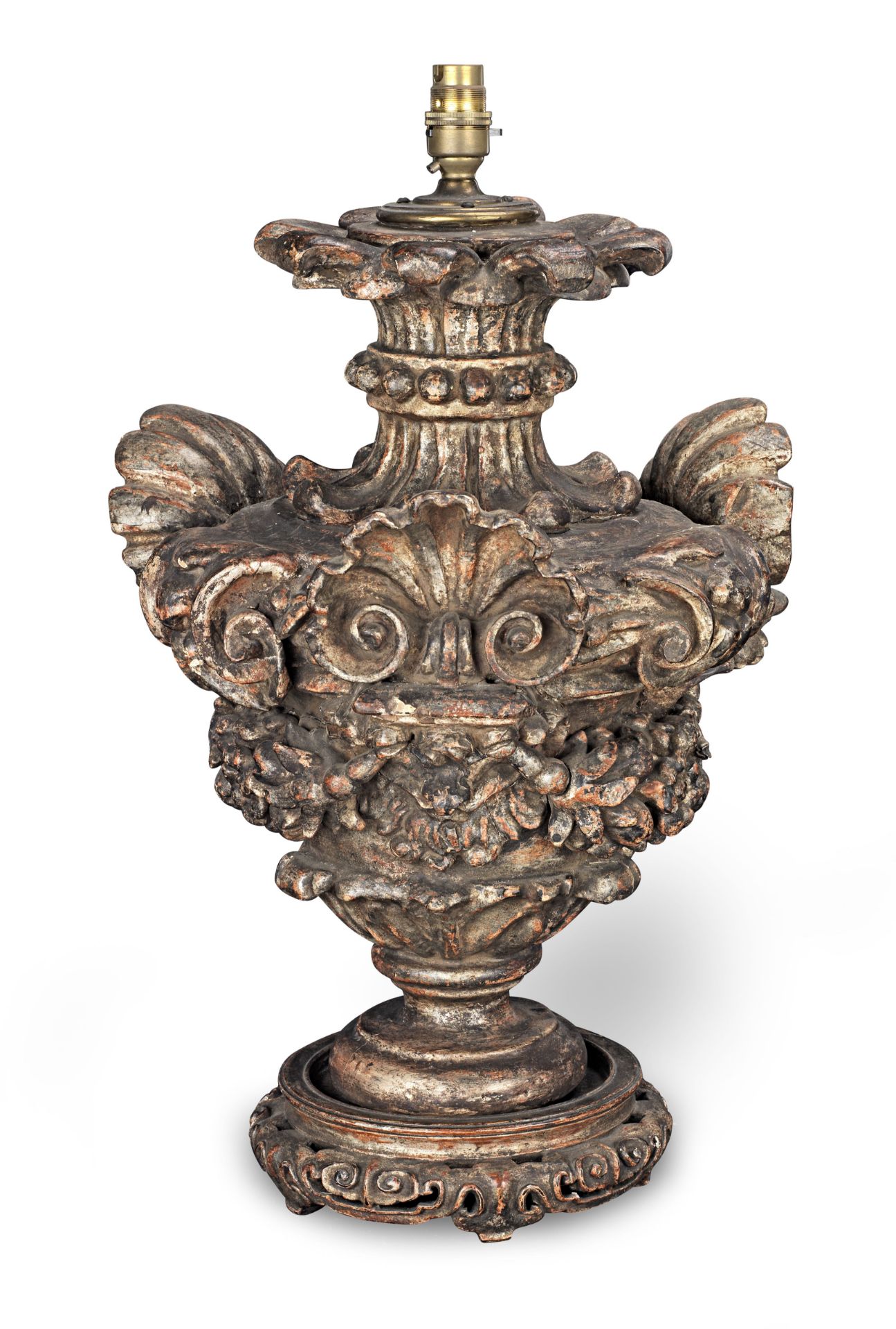 A carved and painted table lamp, with traces of gilding